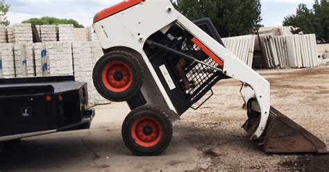 how to load a dead skid steer|drag a skid steer without running.